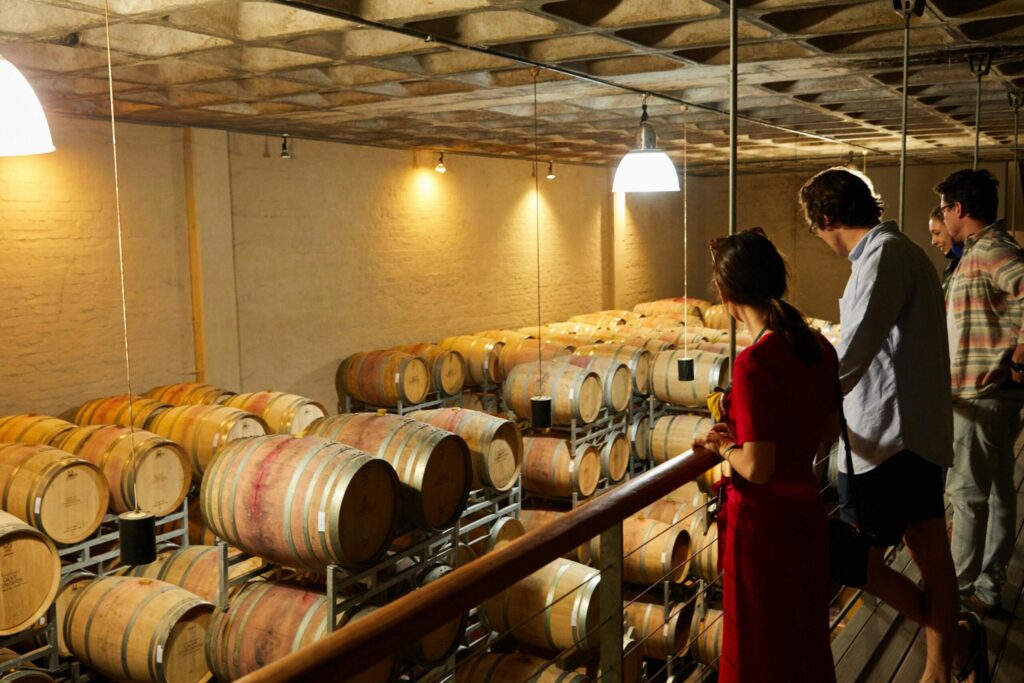 Image of some men and a lady at a local distillery close to their hotel in Kentucky