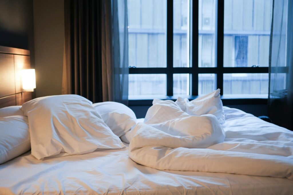 Picture of a hotel's bed near Kentucky kingdom amusement park