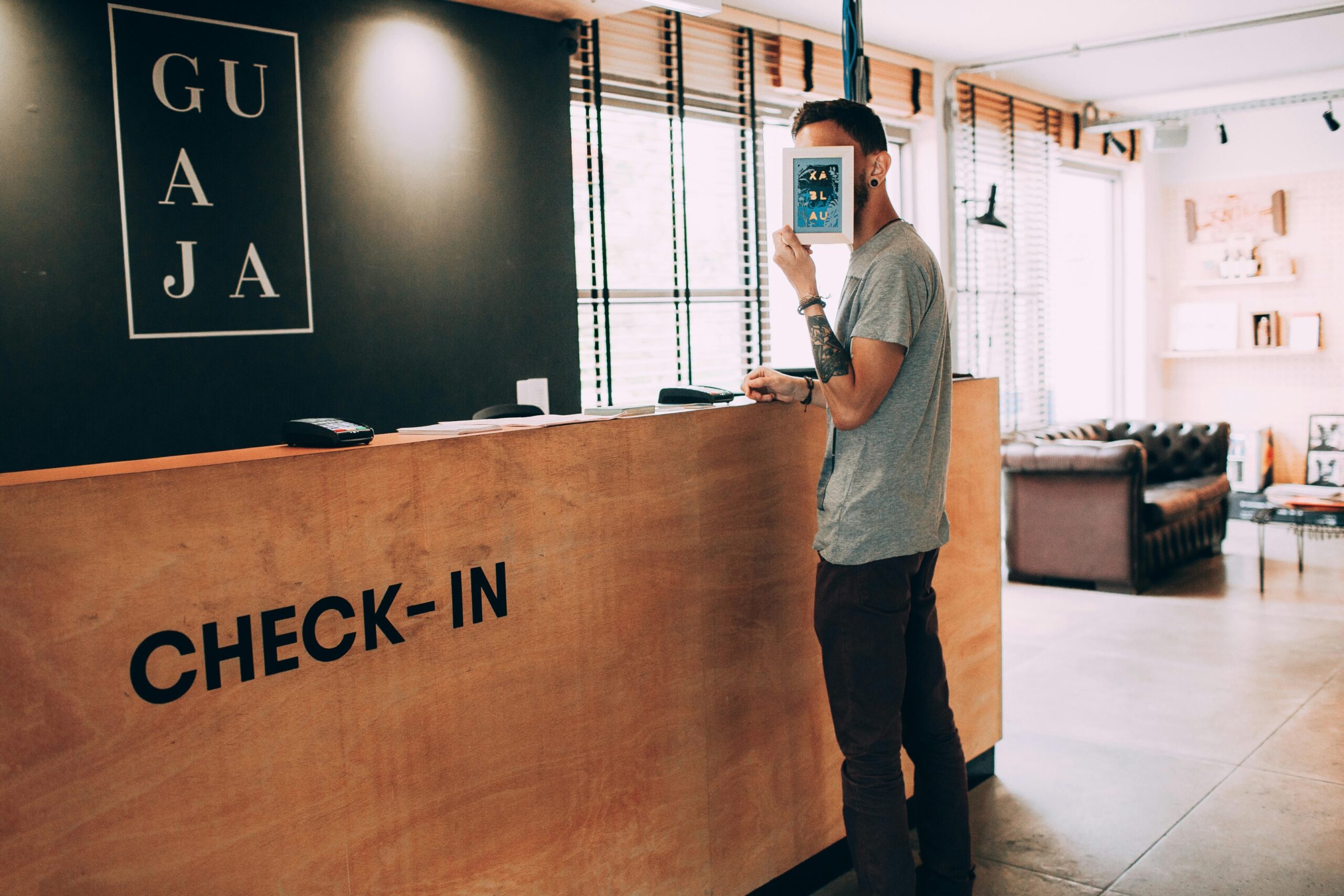 A man checking into a hotel in louisville south